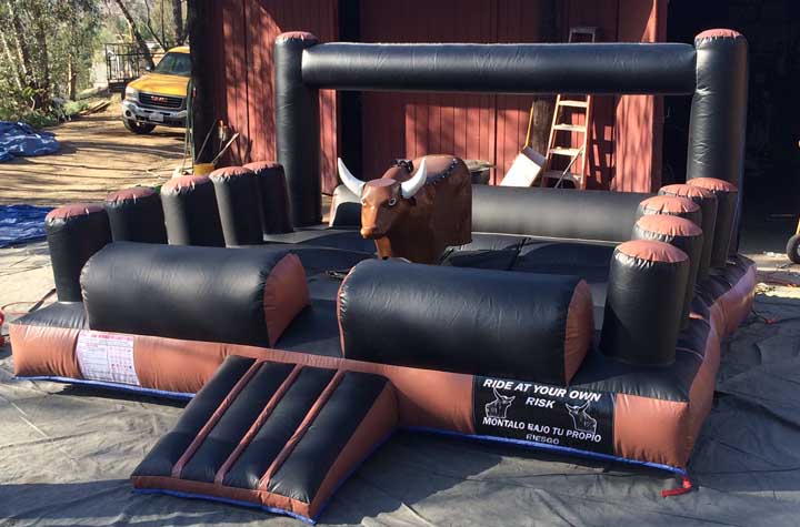 mechanical bull amusement ride for rent side view